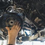 Auto,Mechanic,Installing,A,New,Clutch,Kit,For,A,Car,