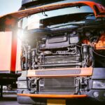Front,Of,Semi,Truck,Engine,Opening,Hood,For,Maintenance,And