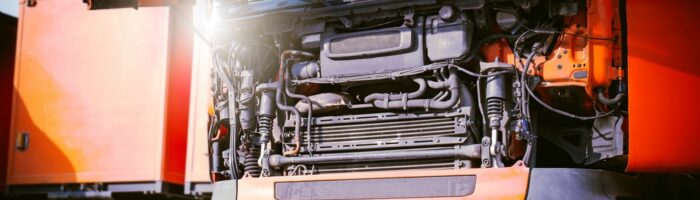 Front,Of,Semi,Truck,Engine,Opening,Hood,For,Maintenance,And
