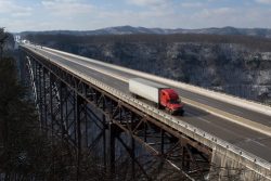 A,Trucker,Drives,Across,The,New,River,Gorge,Bridge,In